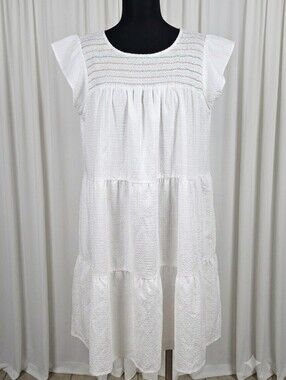 Maxwell & Geraldine "The Rose" dress with a smocked neckline and tiered design.
